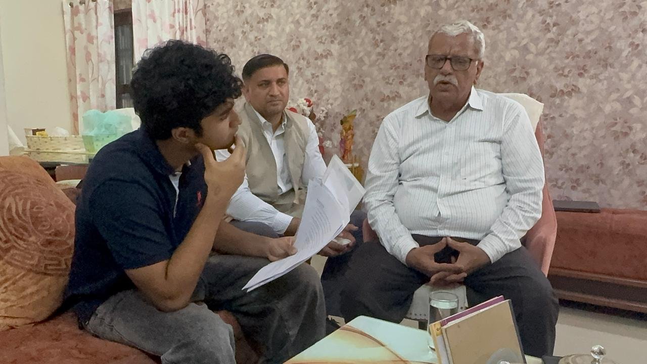 Reviewing a point in the discussion with Mr. Tilak Raj Malhotra and another official
