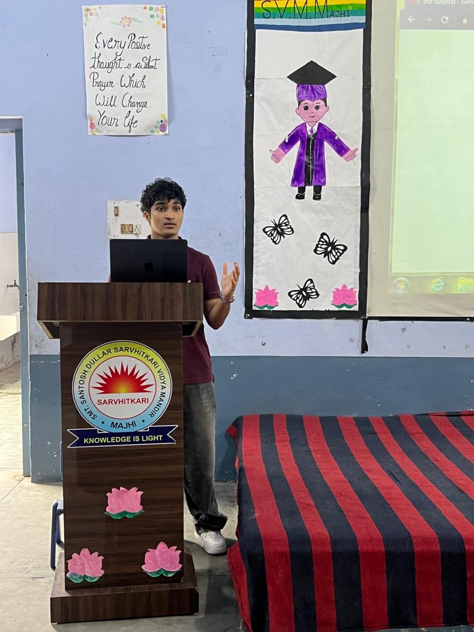 Presenting the petition form at the podium, with the accessible learning materials text visible on screen